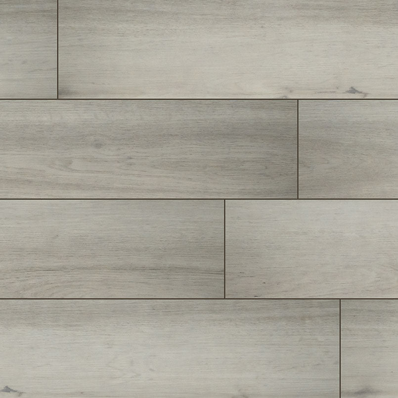 MSI XL Cyrus Brianka Luxury Vinyl Planks (22.44 SQFT/box) feature light gray rigid core planks with subtle grain texture, slight color variations, and CrystaLux protection for durability—delivering a modern, clean look in a staggered layout.